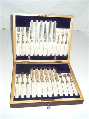 Lot 173 - Cased silver and mother-of-pearl handled cake knives and forks