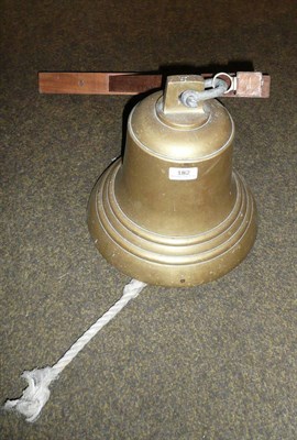 Lot 182 - Large brass bell with bracket