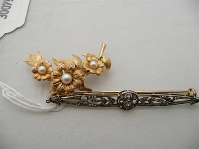 Lot 209 - A 9 carat gold floral brooch set with cultured pearls and a diamond-set bar brooch