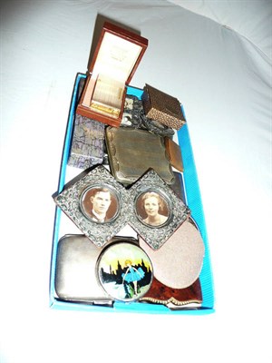 Lot 228 - Three silver cigarette cases, a silver cigar cutter, assorted coins, coin holder, miniature...