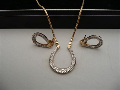 Lot 235 - A 9 carat gold diamond-set horseshoe design earring and necklace set (2)