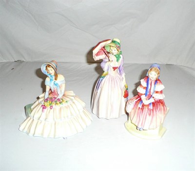 Lot 264 - Three Royal Doulton figures "Miss Demure", "Forget Me Not" and "Day Dreams"