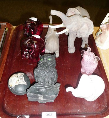 Lot 303 - An Aynsley African bull elephant and a baby bull elephant, two Wedgwood glass elephants and two...