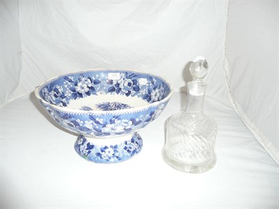 Lot 324 - A blue and white transfer decorated punch bowl and a glass decanter