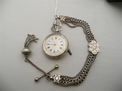 Lot 355 - A silver lady's fob watch and fancy link chain