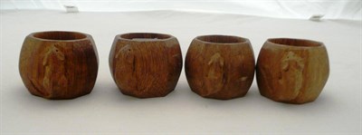 Lot 389 - A set of four Robert "Mouseman" Thompson napkin rings each with carved mouse signature