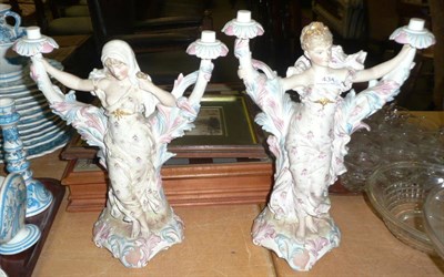 Lot 434 - A pair of KPM bisque figural candelabrum (lacking sconces)