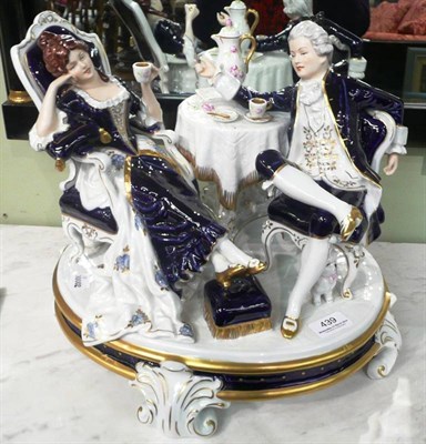 Lot 439 - Modern Royal Dux group of a gentleman and lady taking afternoon tea