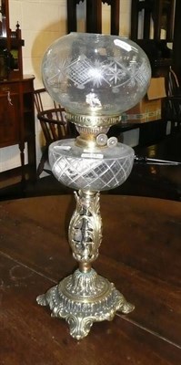 Lot 444 - Brass and clear glass oil lamp