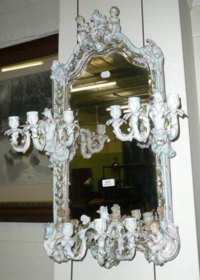 Lot 539 - Continental cherub mirror with candle sconces (a/f)