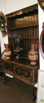 Lot 542 - 20th century oak dresser with fielded panels