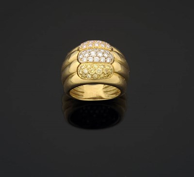 Lot 296 - A Diamond Set Ring, three lozenge shapes are pavé set with pink, white and yellow diamonds to...