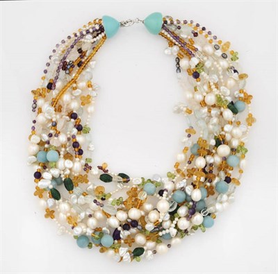 Lot 299 - A Multi Gemstone Torsade, strands including cultured pearls, amazonite, aquamarine, citrine,...