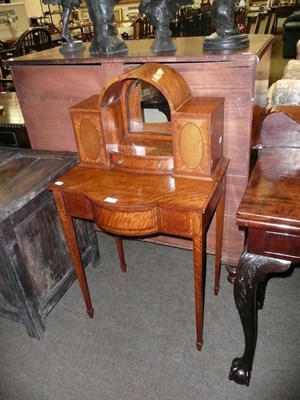 Lot 601 - An Edwardian satinwood lady's small dressing table with broken arch mirrored superstructure