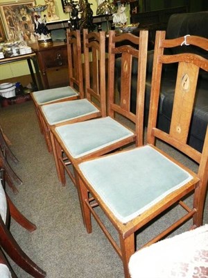 Lot 631 - Four Arts & Crafts oak chairs