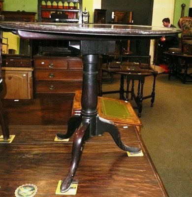 Lot 635 - A mahogany tripod table