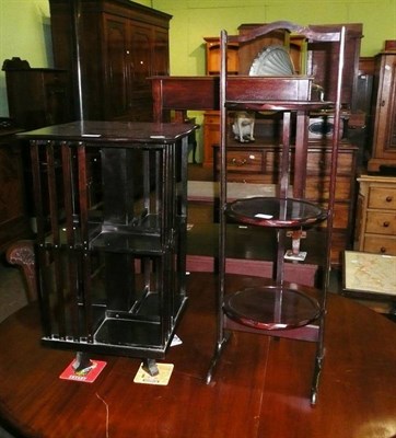 Lot 638 - Small mahogany revolving bookcase and a mahogany cake stand