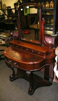 Lot 655 - A Victorian mahogany dressing table, a marble-top washstand and a carved mahogany occasional table