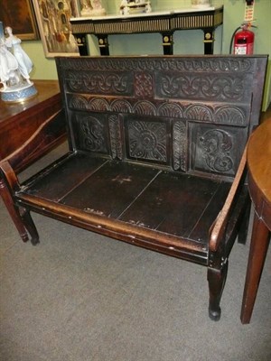 Lot 676 - 18th century and later oak settle