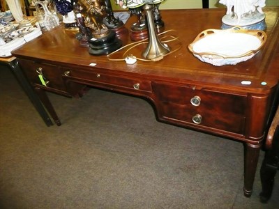 Lot 677 - Leather-top partners desk