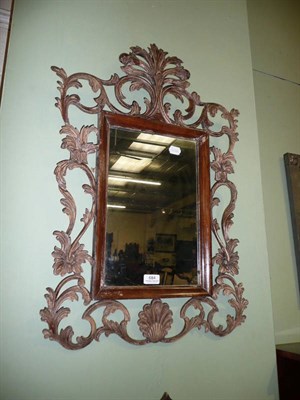 Lot 684 - Mirror in a scroll-work frame