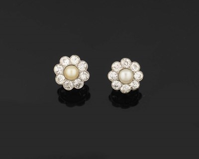 Lot 317 - A Pair of Pearl and Diamond Cluster Earrings, a pearl bordered by eight old cut diamonds in...