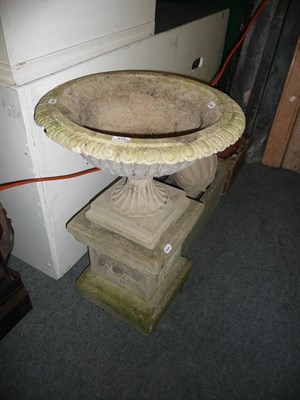 Lot 816 - An urn-shaped planter and three other planters