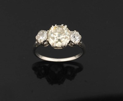 Lot 320 - A Diamond Three Stone Ring, circa 1910, the principal cushion shaped stone flanked by two old...