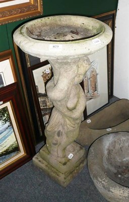 Lot 823 - A cherub bird bath