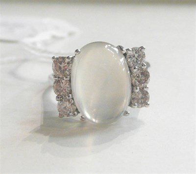 Lot 1 - A 14ct white gold moonstone and diamond ring