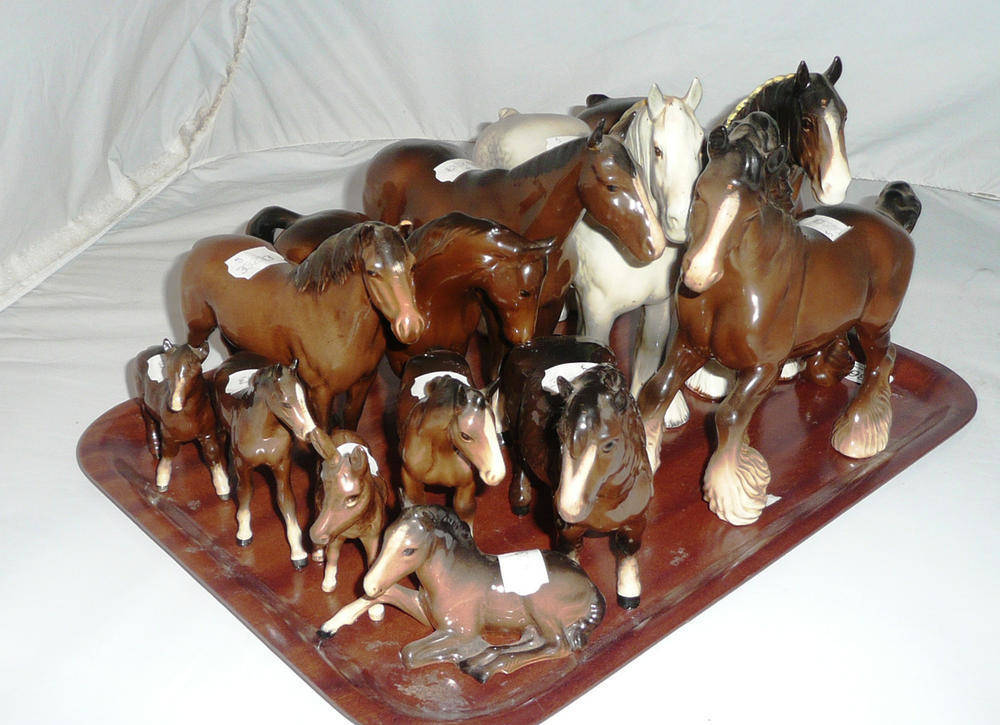 Lot 86 - Twelve pieces of Beswick including three Shire horses, New Forest pony (a.f.), two brown...