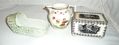 Lot 102 - Pearlware child's crib, circa 1790, money box and Napoleon jug (3)