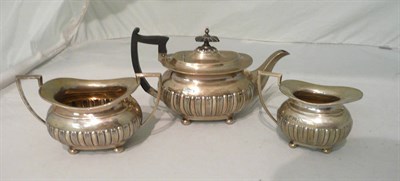 Lot 103 - A three piece silver bachelors tea service, Sheffield assay 25 oz