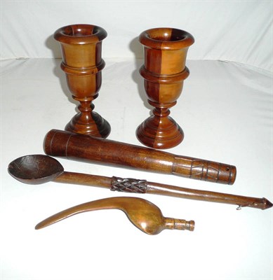 Lot 145 - Two cedar wood cups, a wooden club, knitting sheath and a wooden spoon