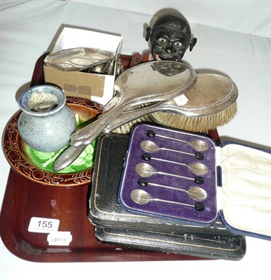Lot 155 - A tray including a jolly nigger moneybox, silver-backed brushes, silver salt, mustard pot, etc