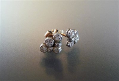 Lot 337 - A Pair of Diamond Cluster Stud Earrings, four old cut diamonds in white collet settings with...