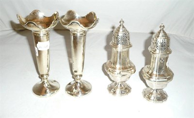 Lot 166 - A pair of silver casters and a pair of silver vases