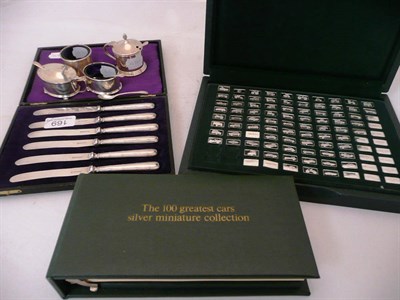 Lot 169 - Silver condiment, cased silver-handled tea knives and silver miniature car medallions