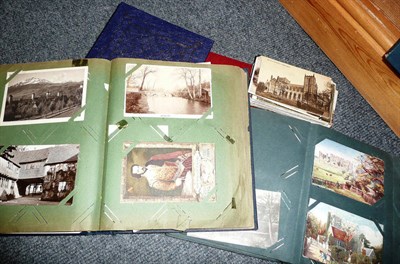 Lot 173 - A collection of postcards in albums and loose and an album of cartes de visite