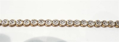 Lot 185 - A diamond line bracelet