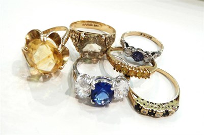 Lot 186 - A 9ct gold smokey quartz ring, a citrine ring, three dress rings and a silver ring