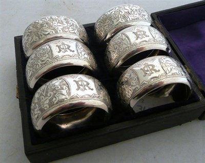 Lot 202 - Cased set of six silver napkin rings