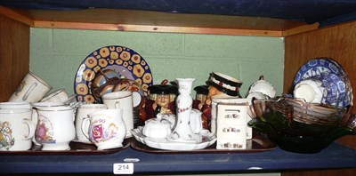 Lot 214 - A quantity of decorative ceramics including Doulton plates, Bunnykins and Pooh money boxes, tea...