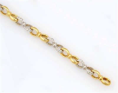 Lot 344 - An 18 Carat Gold Diamond Bracelet, plain yellow hoop links are alternated with diamond set...