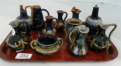 Lot 252 - A collection of small Doulton stoneware items (11)