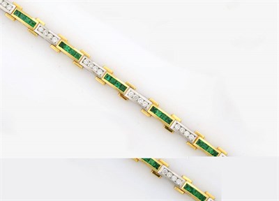 Lot 346 - An 18 Carat Gold Emerald and Diamond Bracelet, a repeating series of four step cut emeralds channel