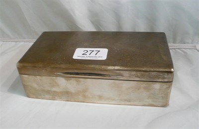 Lot 277 - A silver cigarette box, London assay, 18 oz