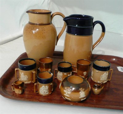 Lot 288 - A tray including, miniature Royal Doulton stoneware beakers, Royal Doulton blue glazed jug, etc