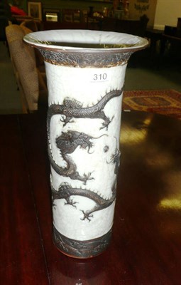 Lot 310 - A late 19th century Chinese crackle glaze vase decorated in relief with a writhing dragon with...