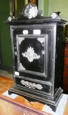 Lot 318 - An ebonised table cabinet with fitted interior